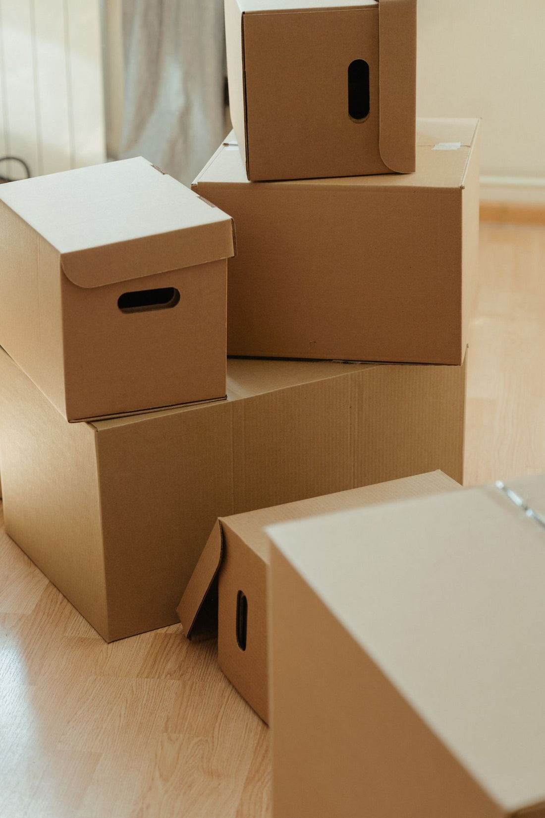 Stacked cardboard moving boxes