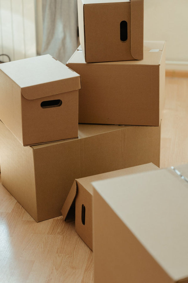 Stacked cardboard moving boxes